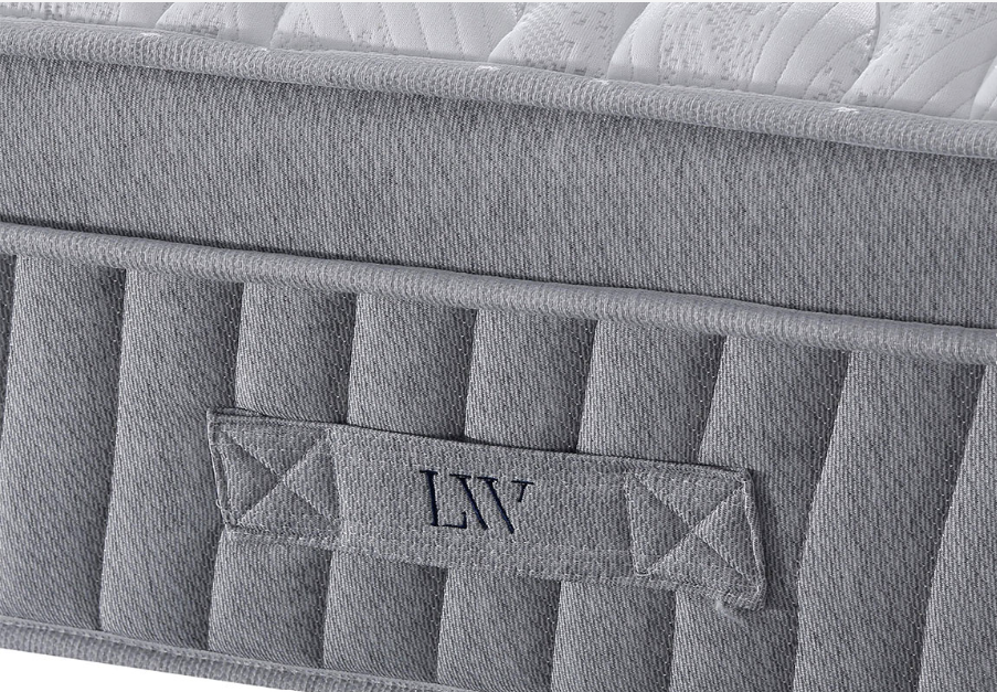 Loren Williams Tranquilty Mattress side view with logo